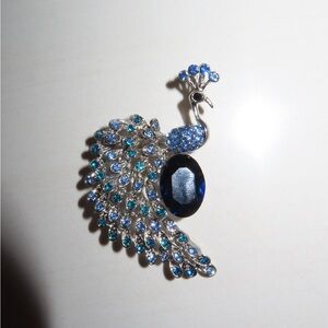 Elegant Blue and Silver Peacock Brooch